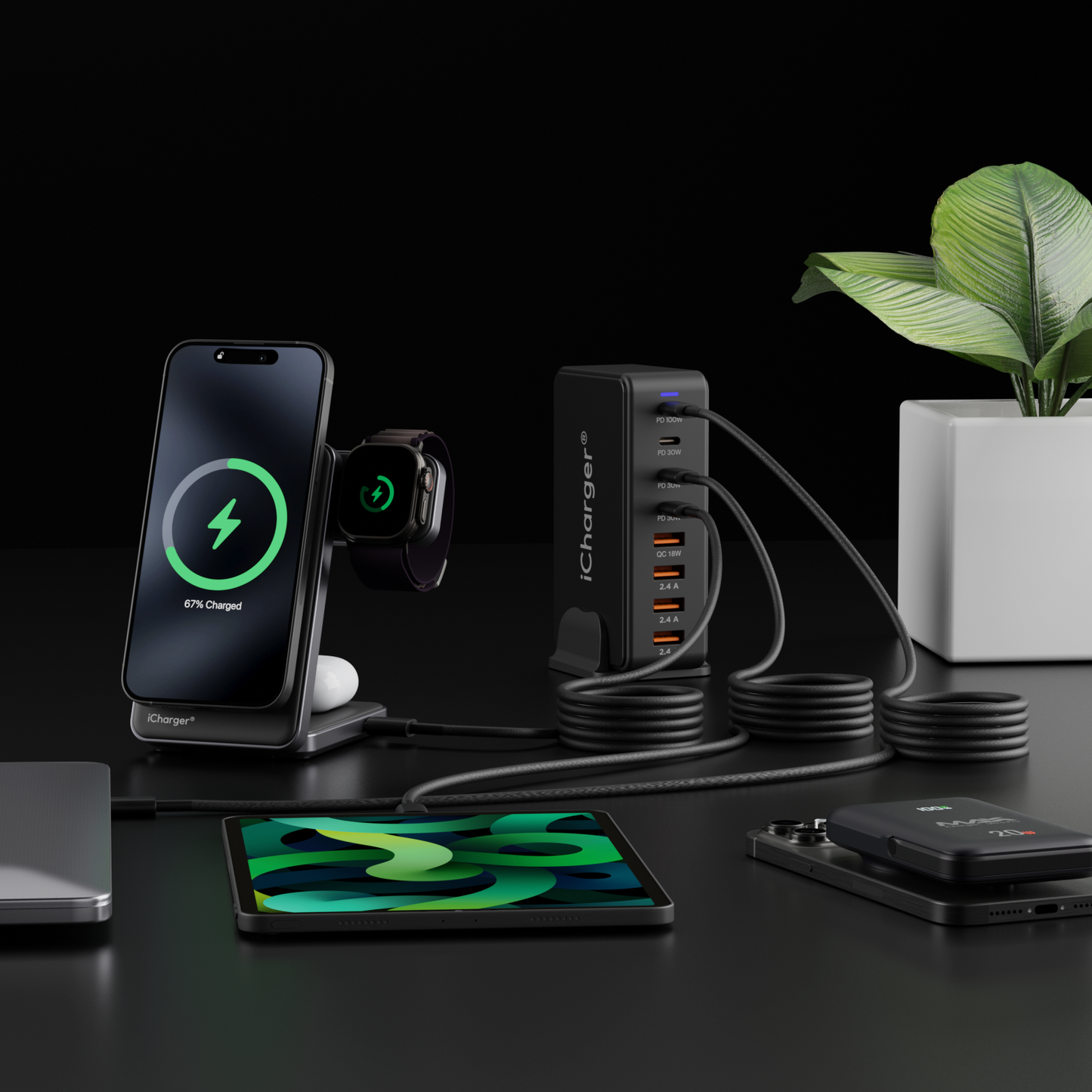 iCharger 240W GaN3 Ultra Charging Station setup with multiple devices including smartphone, smartwatch, tablet, and laptop for efficient charging