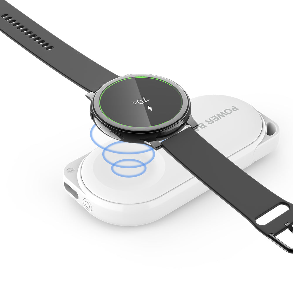 Samsung Galaxy Watch charging wirelessly on compact iCharger MicroBOOST, perfect for portable power