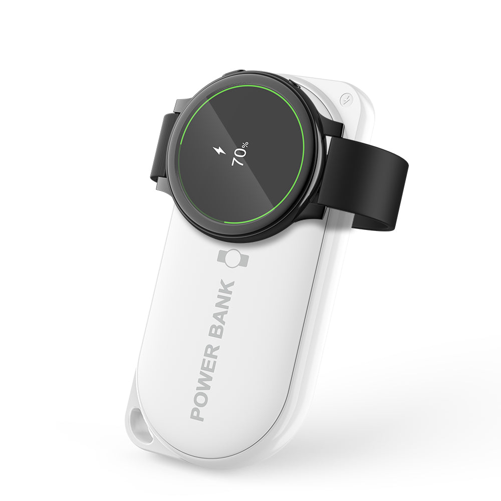 Samsung Galaxy Watch charging on a white iCharger MicroBOOST wireless power bank, designed for fast charging